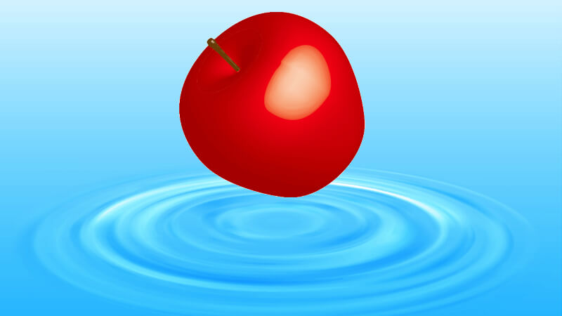 りんごが水に沈んでいく